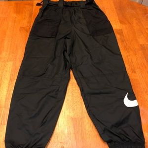 Black Nike windbreaker pants w/ belt buckles and belt (2 pockets)